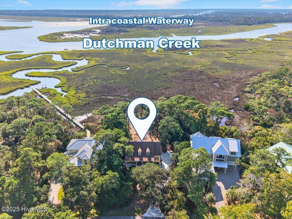 Photo of 5990 Dutchman Creek Road, Southport, NC 28461 (MLS # 100531837)