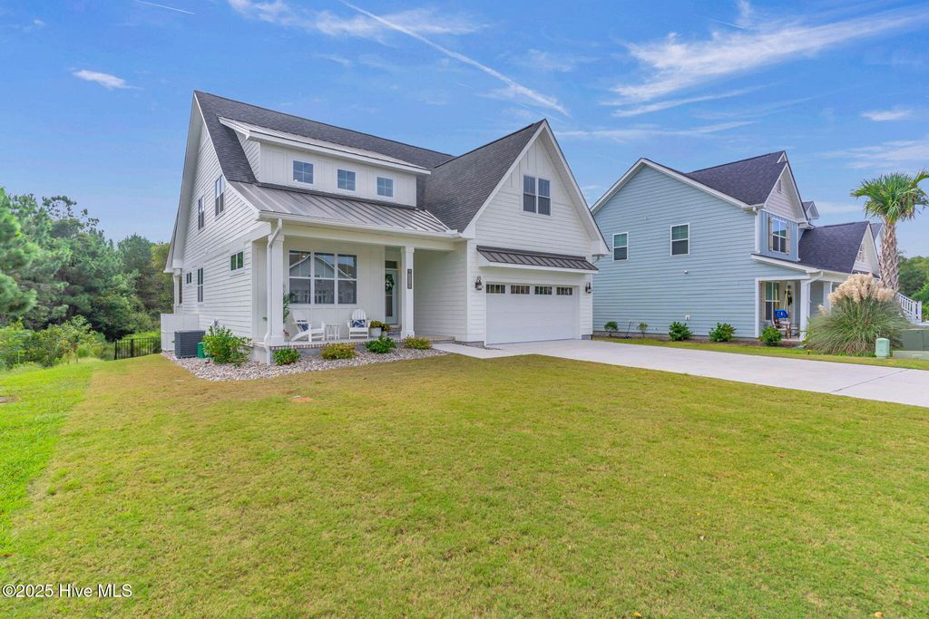 Photo of 318 Spicer Lake Drive, Holly Ridge, NC 28445 (MLS # 100534026)