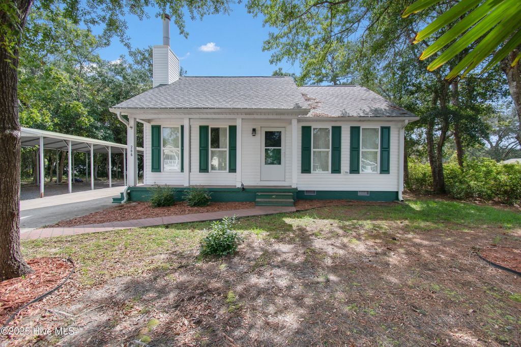Photo of 206 NE 45th Street, Oak Island, NC 28465 (MLS # 100527758)