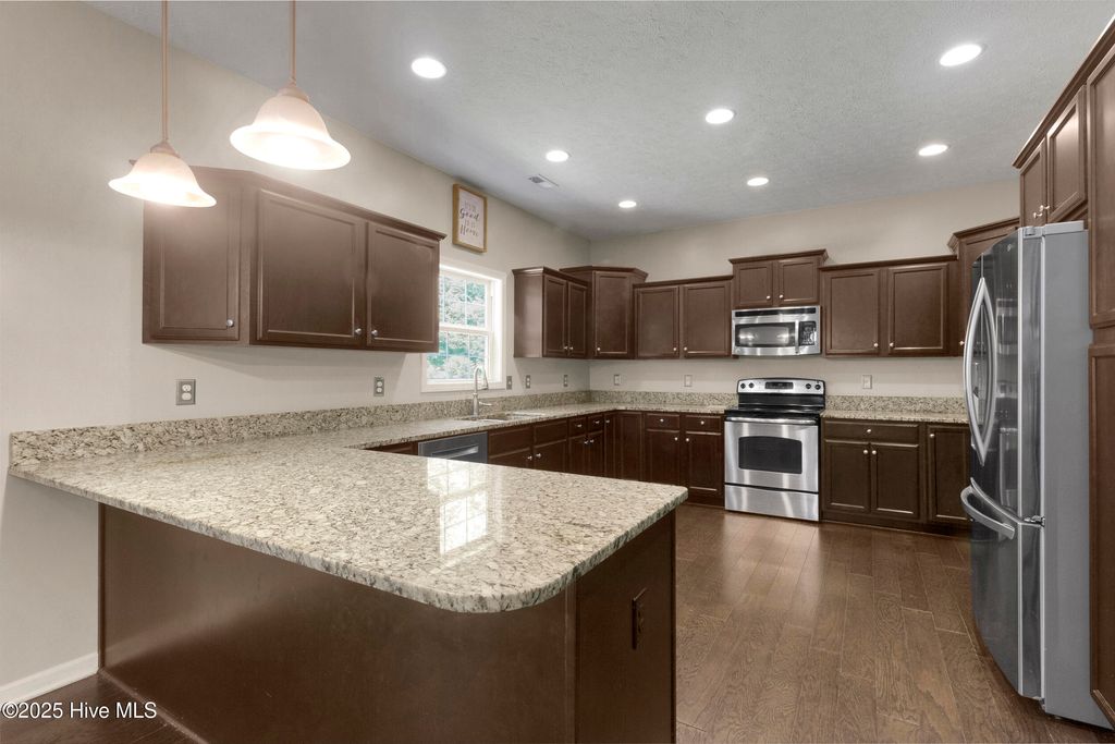 Photo of 303 Calico Drive, New Bern, NC 28560 (MLS # 100522429)