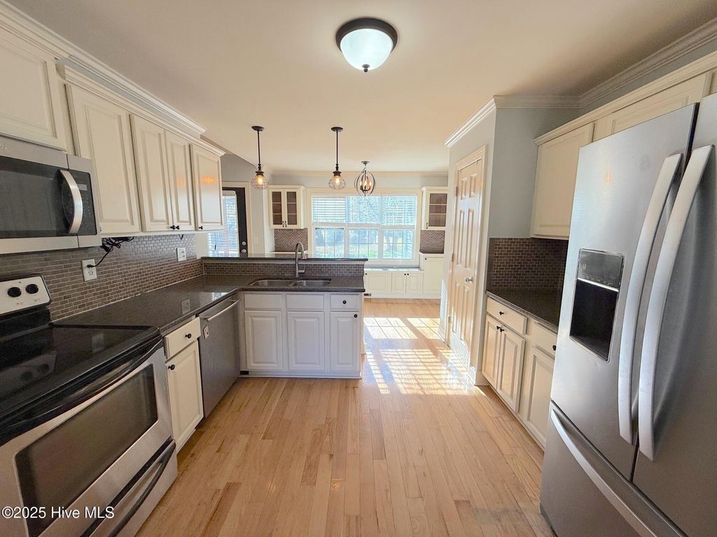 Photo of 3156 Juniper Branch Drive, Grimesland, NC 27837 (MLS # 100543188)