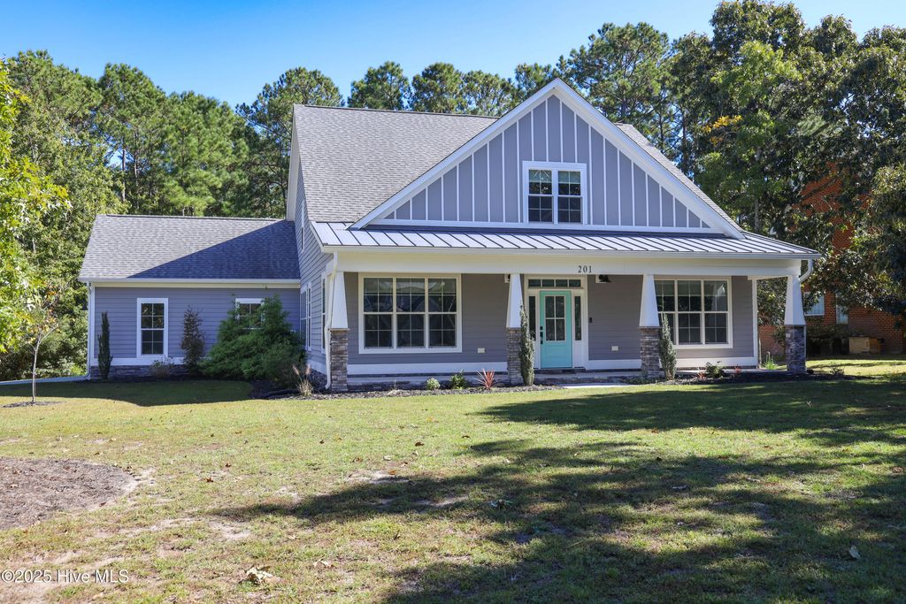 Photo of 201 S Grist Mill Road, Hampstead, NC 28443 (MLS # 100514875)