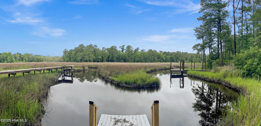 Photo of 201 S Grist Mill Road, Hampstead, NC 28443 (MLS # 100514875)