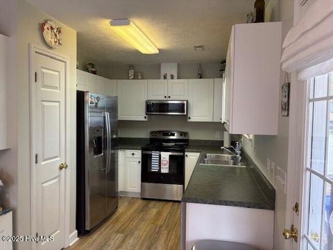 Tiny photo for 2308 E Oak Island Drive, Oak Island, NC 28465 (MLS # 100538319)