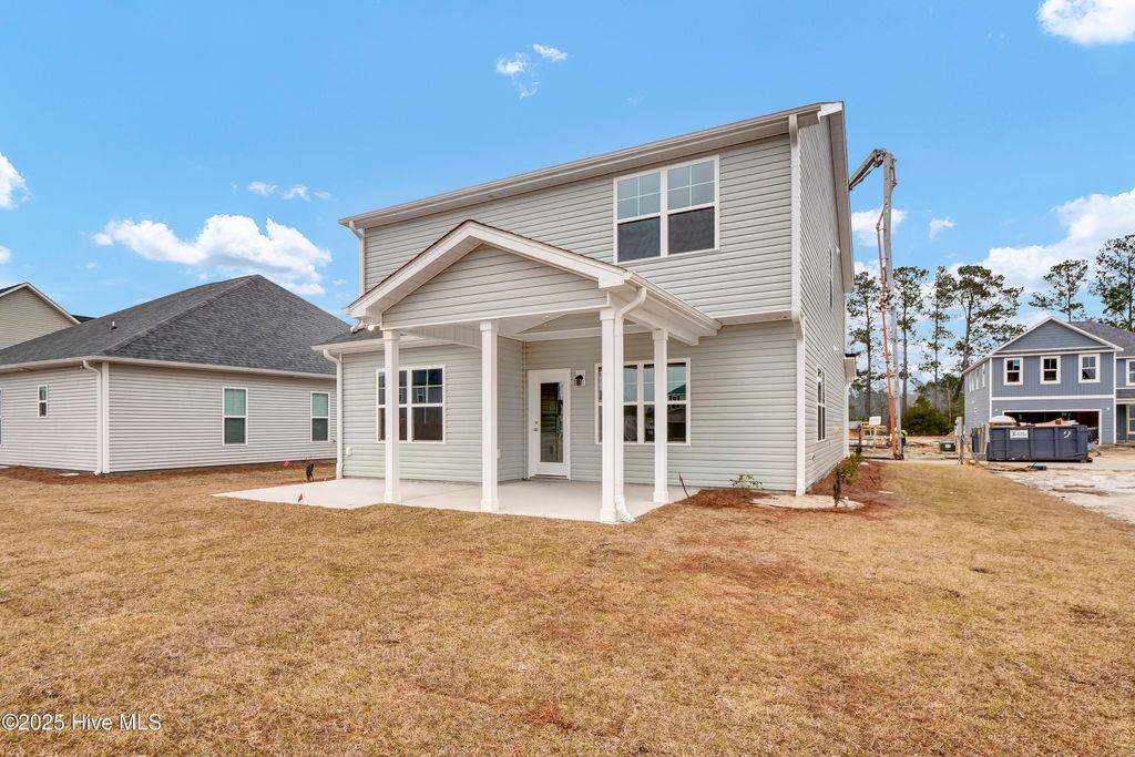 Photo of 809 Red Sky Drive NE, Winnabow, NC 28479 (MLS # 100543348)