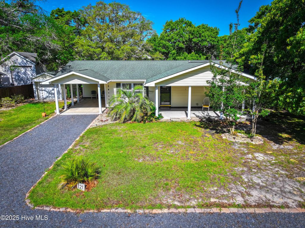 Photo of 121 NW 1st Street, Oak Island, NC 28465 (MLS # 100504444)