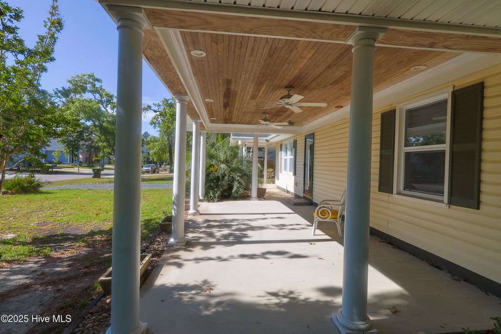 Photo of 121 NW 1st Street, Oak Island, NC 28465 (MLS # 100504444)