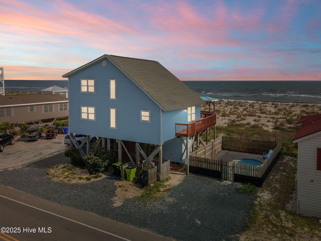 Photo of 3229 E Beach Drive, Oak Island, NC 28465 (MLS # 100508496)