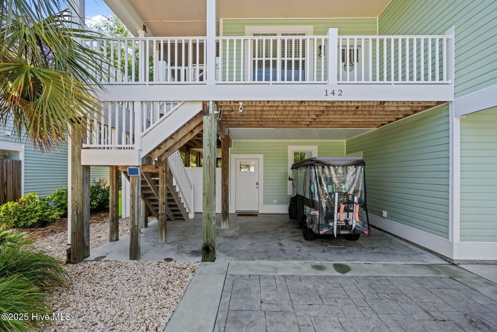 Photo of 142 NW 12th Street, Oak Island, NC 28465 (MLS # 100521315)