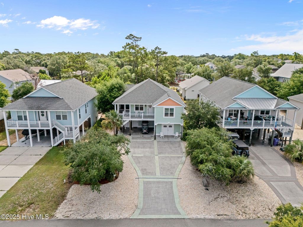 Photo of 142 NW 12th Street, Oak Island, NC 28465 (MLS # 100521315)