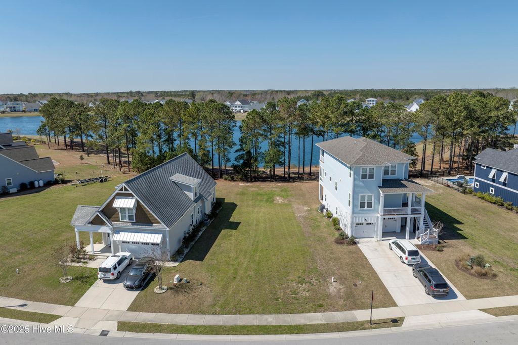 Photo of 176 Spicer Lake Drive, Holly Ridge, NC 28445 (MLS # 100543712)