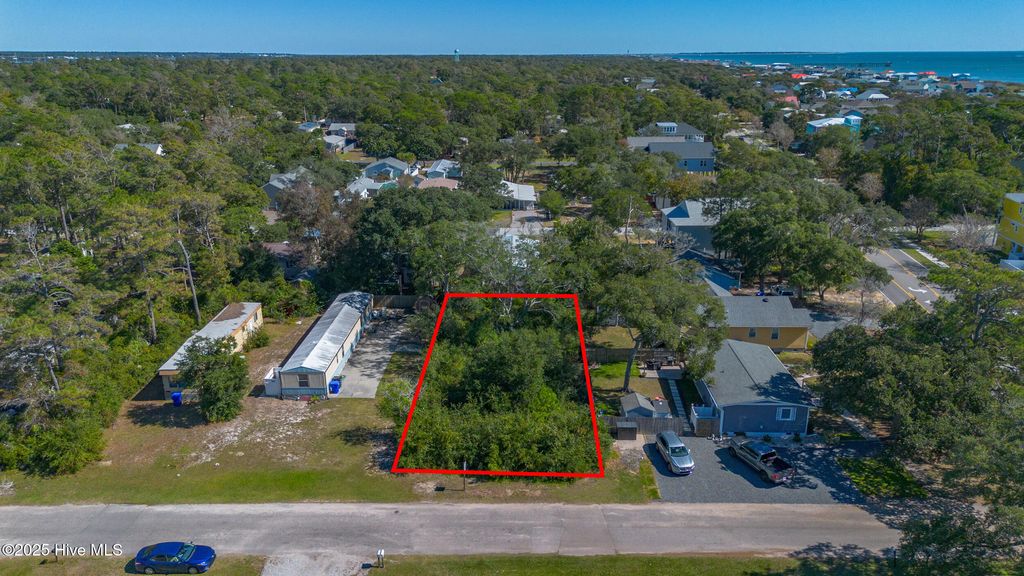 Photo of 102 NE 66th Street, Oak Island, NC 28465 (MLS # 100537343)