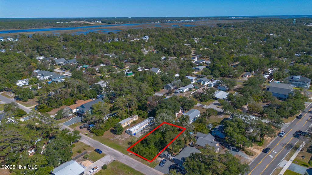 Photo of 102 NE 66th Street, Oak Island, NC 28465 (MLS # 100537343)