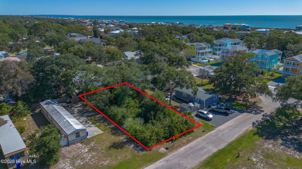 Photo of 102 NE 66th Street, Oak Island, NC 28465 (MLS # 100537343)
