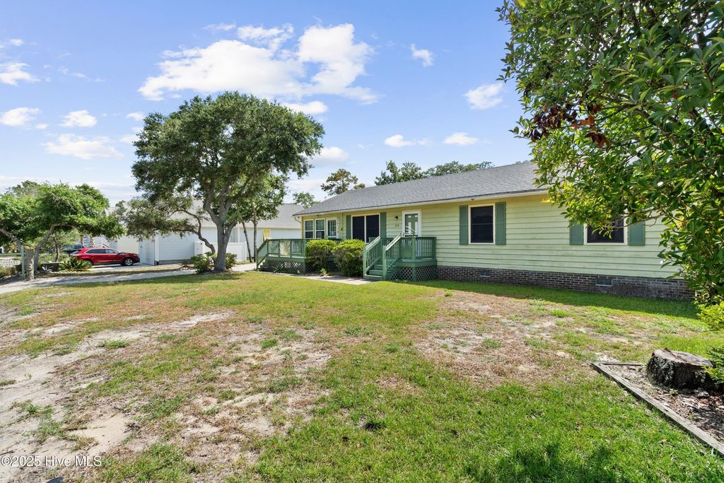 Photo of 210 NE 52nd Street, Oak Island, NC 28465 (MLS # 100521940)
