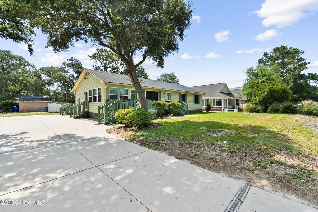 Photo of 210 NE 52nd Street, Oak Island, NC 28465 (MLS # 100521940)