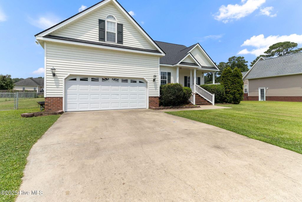 Photo of 203 Maddux Drive, Pikeville, NC 27863 (MLS # 100512144)