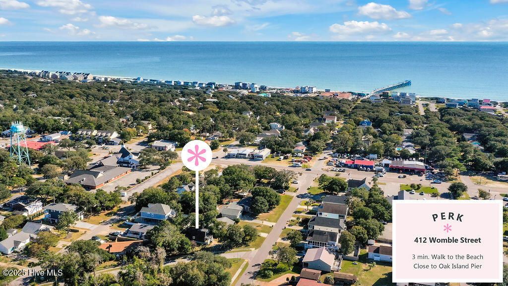 Photo of 412 Womble Street, Oak Island, NC 28465 (MLS # 100538835)