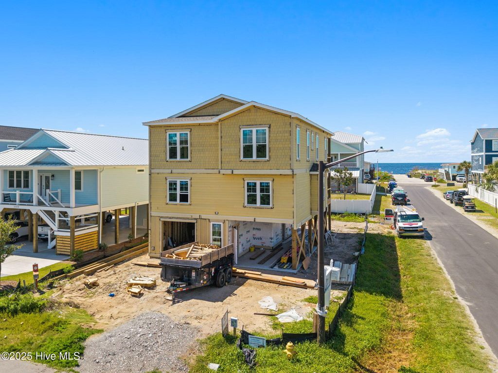 Photo of 5201 E Pelican Drive, Oak Island, NC 28465 (MLS # 100511902)