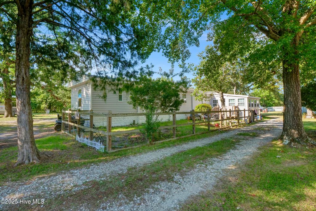 Photo of 215 Anderson Drive, Hampstead, NC 28443 (MLS # 100522648)
