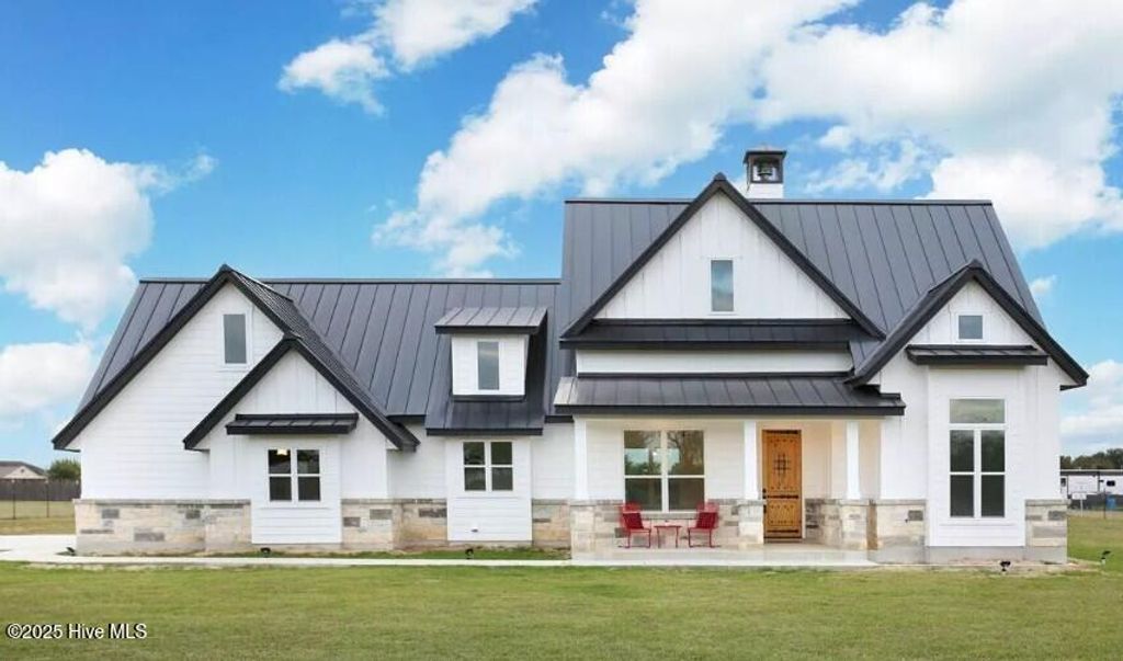 Photo of 557 Sanctuary Point SW, Supply, NC 28462 (MLS # 100533177)