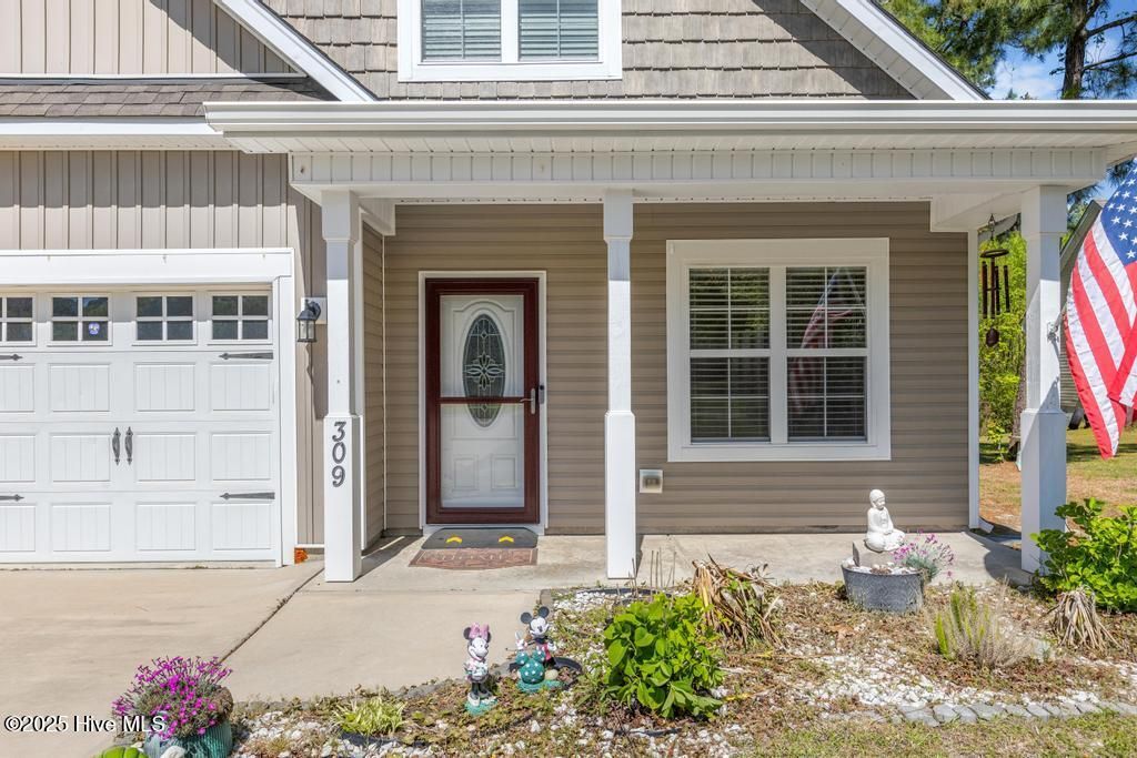 Photo of 309 Chadwick Shores Drive, Sneads Ferry, NC 28460 (MLS # 100503322)