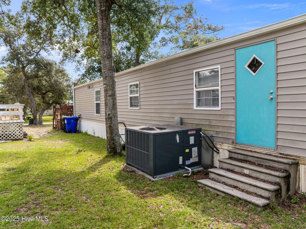 Photo of 137 NE 76th Street, Oak Island, NC 28465 (MLS # 100530512)
