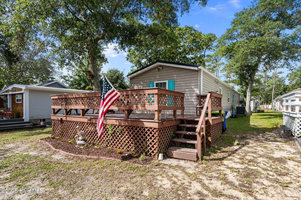 Photo of 137 NE 76th Street, Oak Island, NC 28465 (MLS # 100530512)