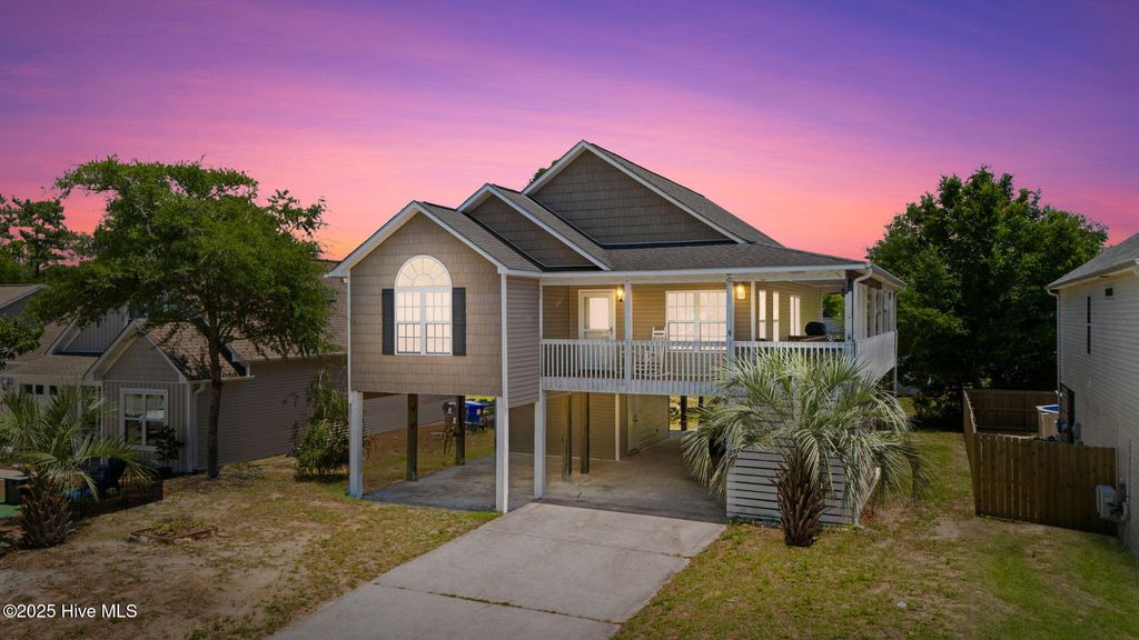 Photo of 126 NE 5th Street, Oak Island, NC 28465 (MLS # 100511663)