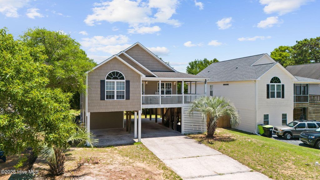 Photo of 126 NE 5th Street, Oak Island, NC 28465 (MLS # 100511663)