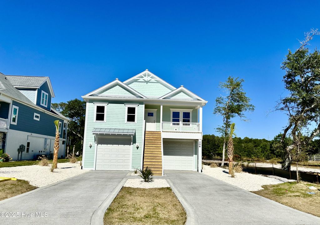 Photo of 306 E Yacht Drive, Oak Island, NC 28465 (MLS # 100537365)