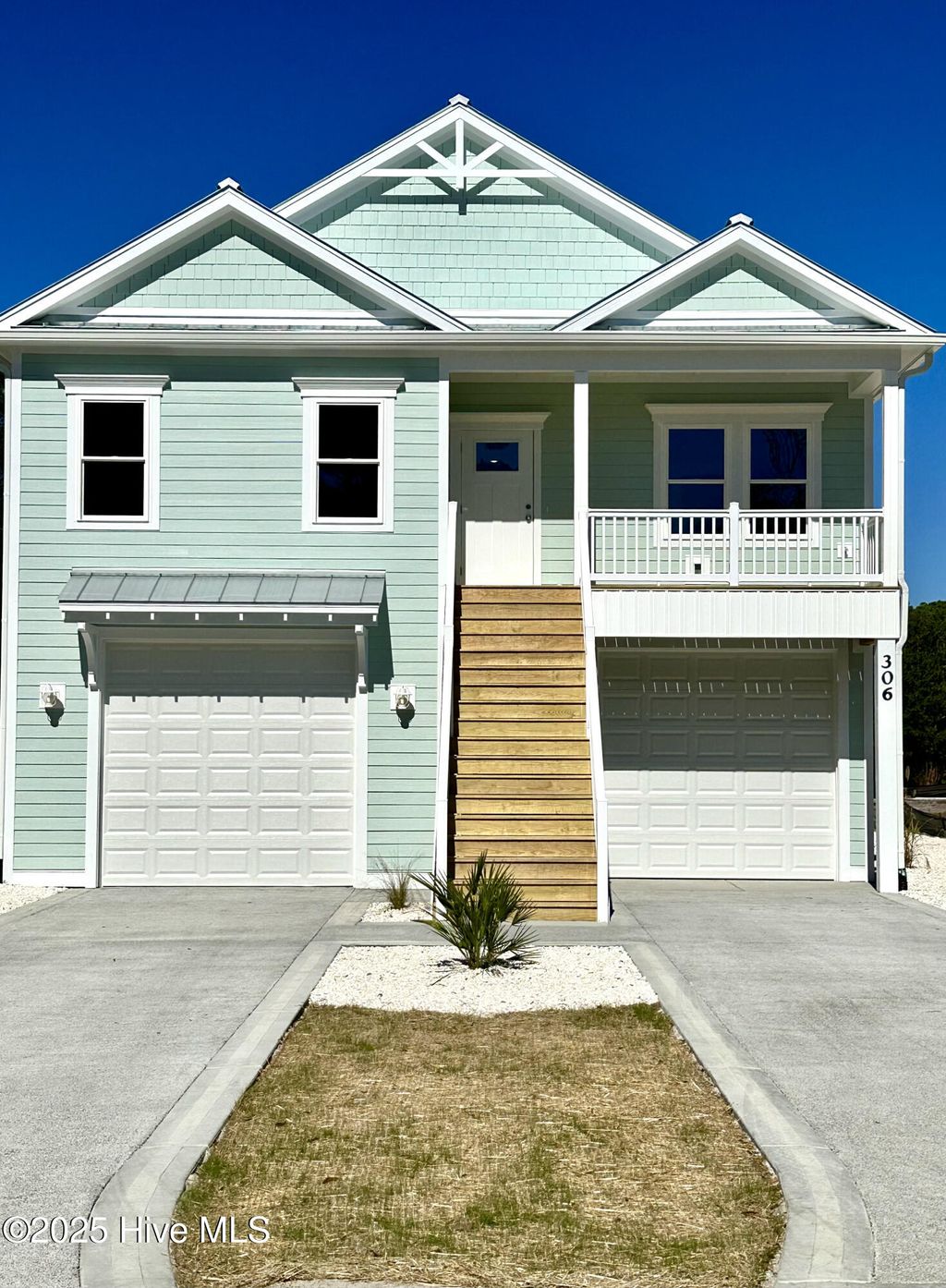 Photo of 306 E Yacht Drive, Oak Island, NC 28465 (MLS # 100537365)