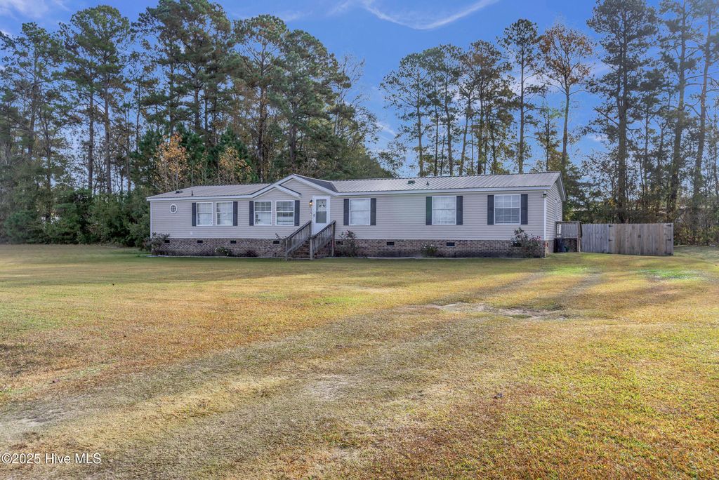 Photo of 406 King Arthur Drive, Whiteville, NC 28472 (MLS # 100543887)
