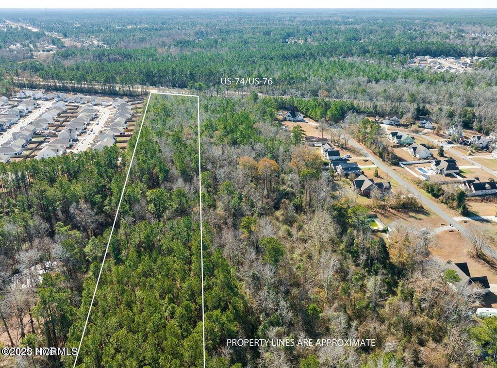 Photo of 1287 Village Road NE, Leland, NC 28451 (MLS # 100516394)
