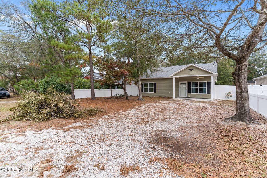 Photo of 112 NW 3rd Street, Oak Island, NC 28465 (MLS # 100543920)