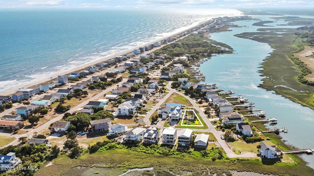 Photo of 3602 W Pelican Drive, Oak Island, NC 28465 (MLS # 100505848)