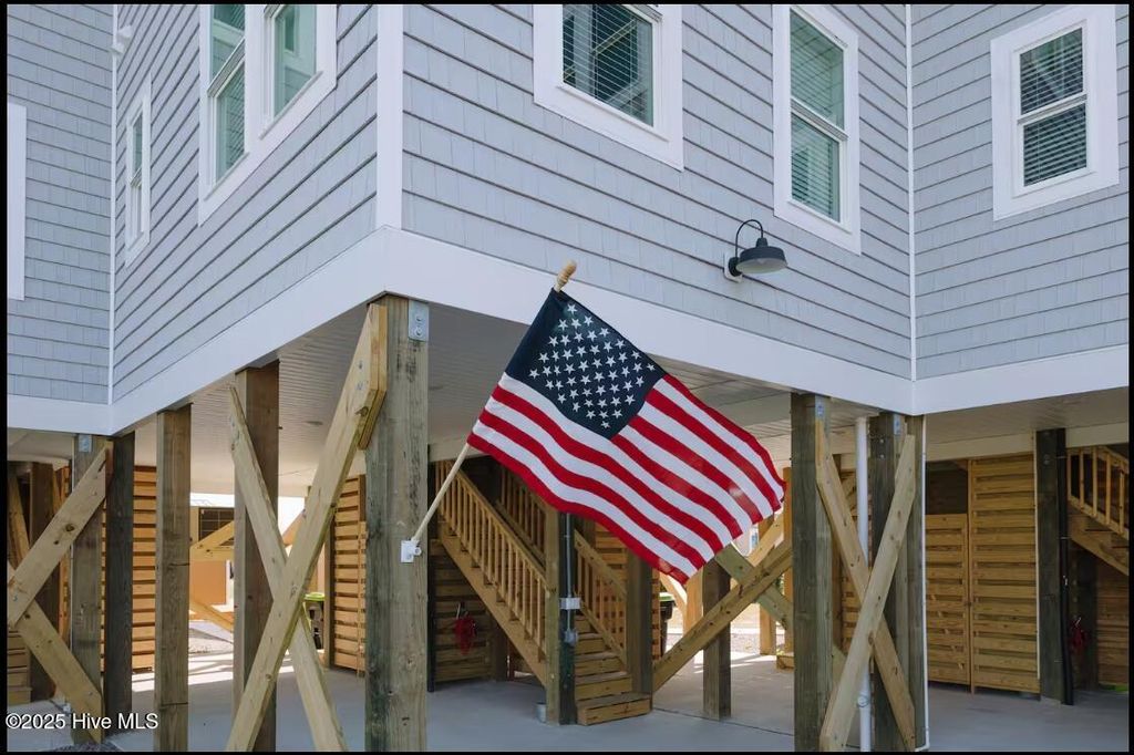 Photo of 804 N Topsail Drive #D, Surf City, NC 28445 (MLS # 100543911)