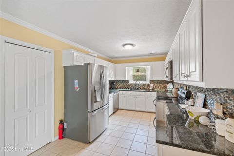Tiny photo for 101 W Oak Island Drive, Oak Island, NC 28465 (MLS # 100535762)