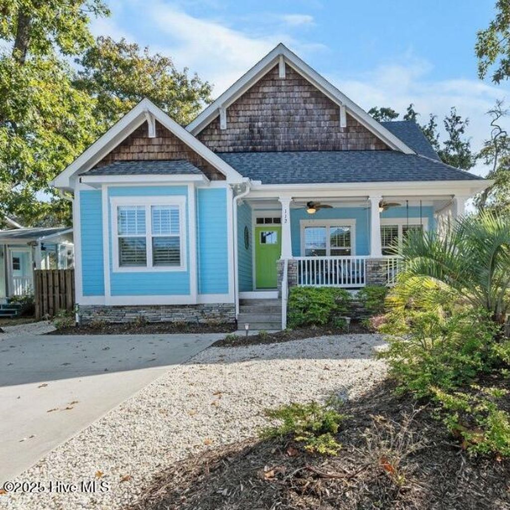 Photo of 112 NE 28th Street, Oak Island, NC 28465 (MLS # 100529128)