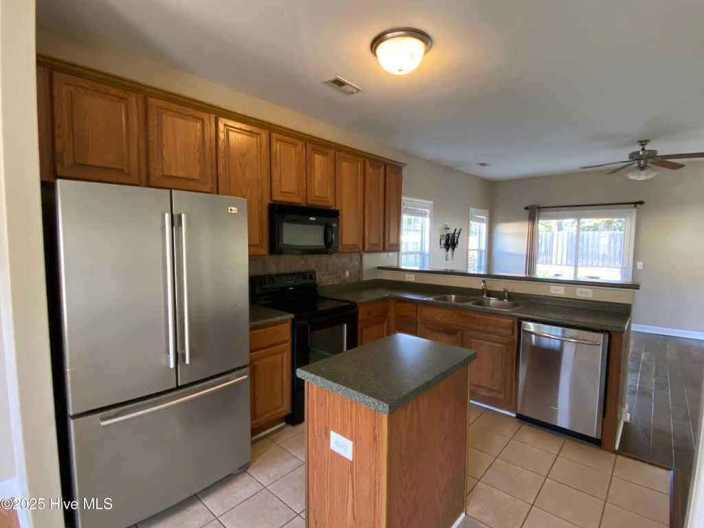 Photo of 1014 Lake Norman Lane, Leland, NC 28451 (MLS # 100539135)