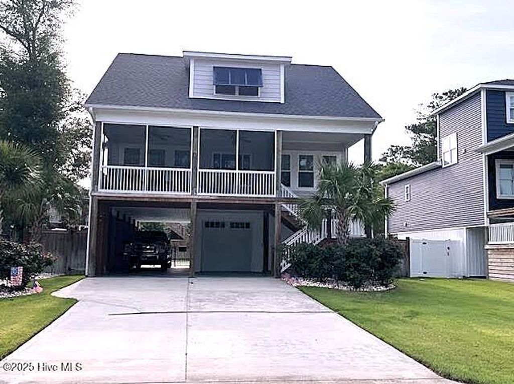 Photo of 245 NE 64th Street, Oak Island, NC 28465 (MLS # 100489225)