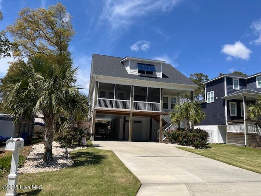Photo of 245 NE 64th Street, Oak Island, NC 28465 (MLS # 100489225)
