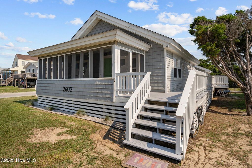 Photo of 2602 E Beach Drive, Oak Island, NC 28465 (MLS # 100537194)