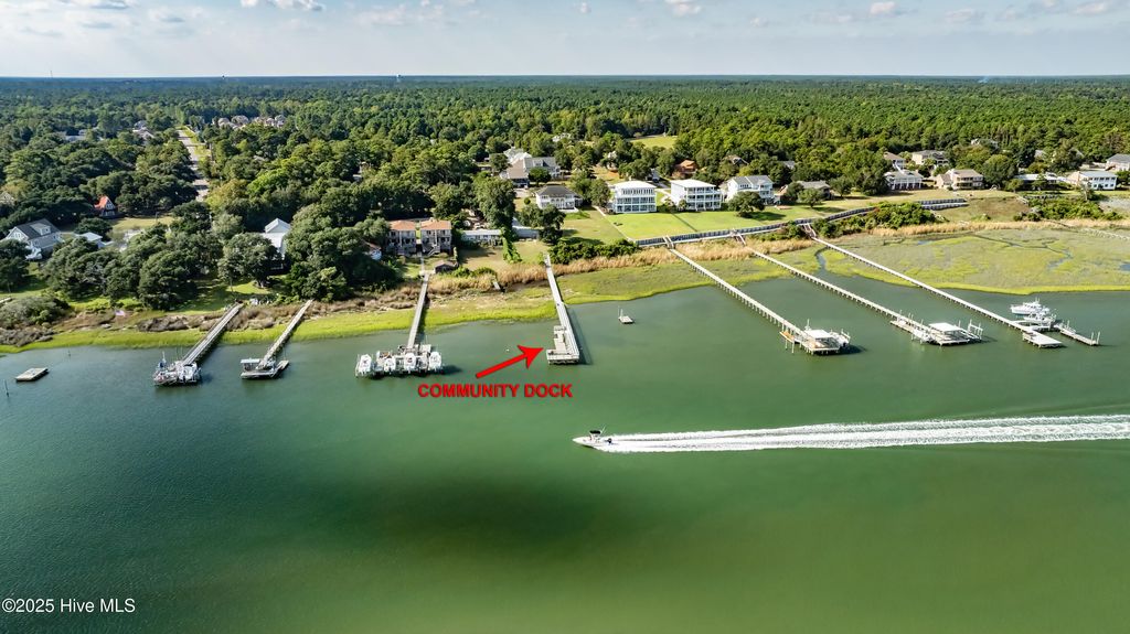 Photo of 115 Dolphin Drive, Hampstead, NC 28443 (MLS # 100531962)