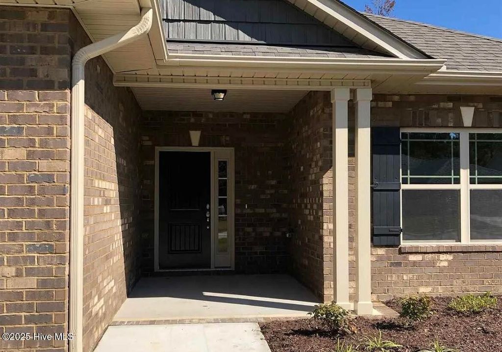 Photo of 208 S Merganser Drive, Pikeville, NC 27863 (MLS # 100539260)