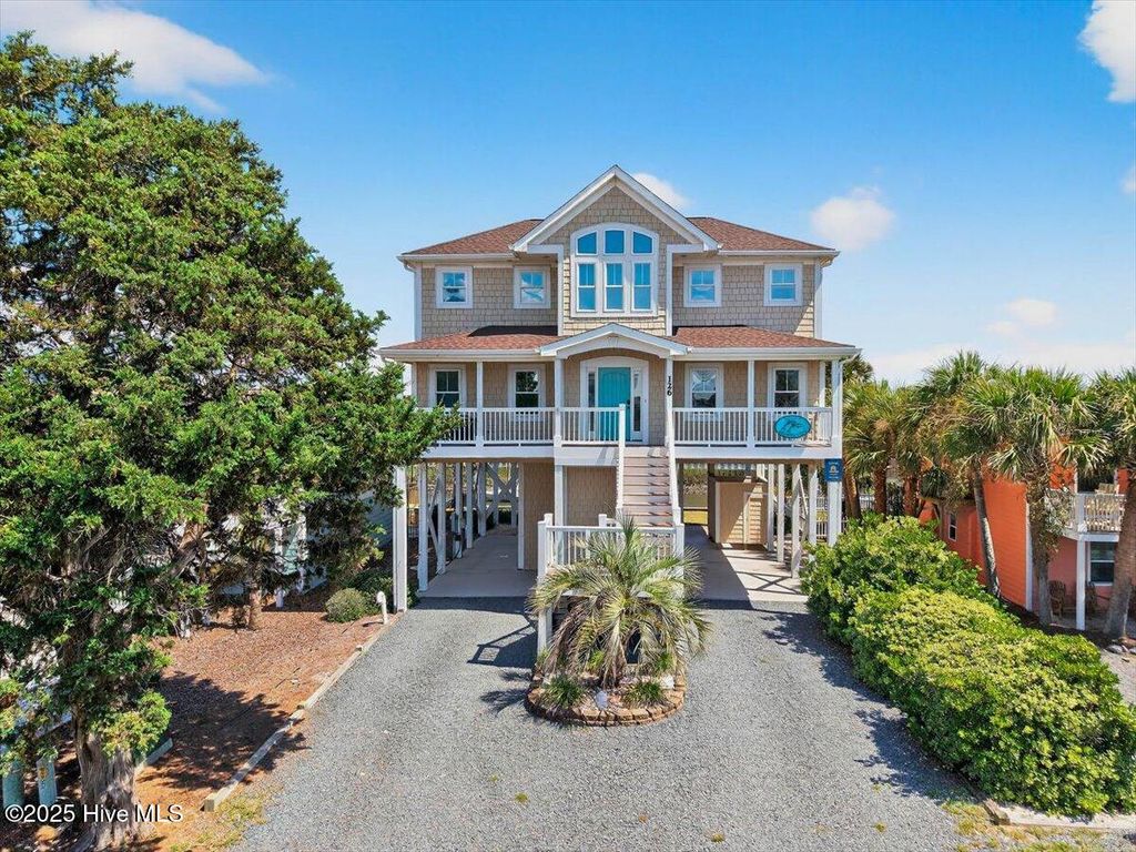 Photo of 126 Dolphin Street SW, Holden Beach, NC 28462 (MLS # 100529673)