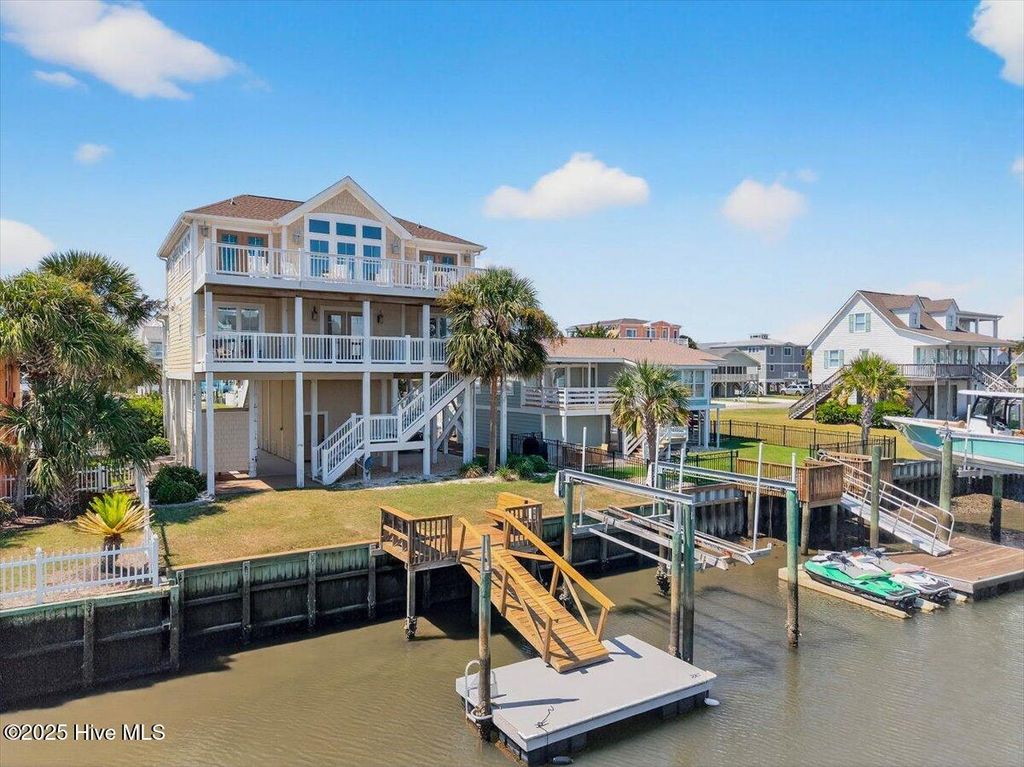 Photo of 126 Dolphin Street SW, Holden Beach, NC 28462 (MLS # 100529673)