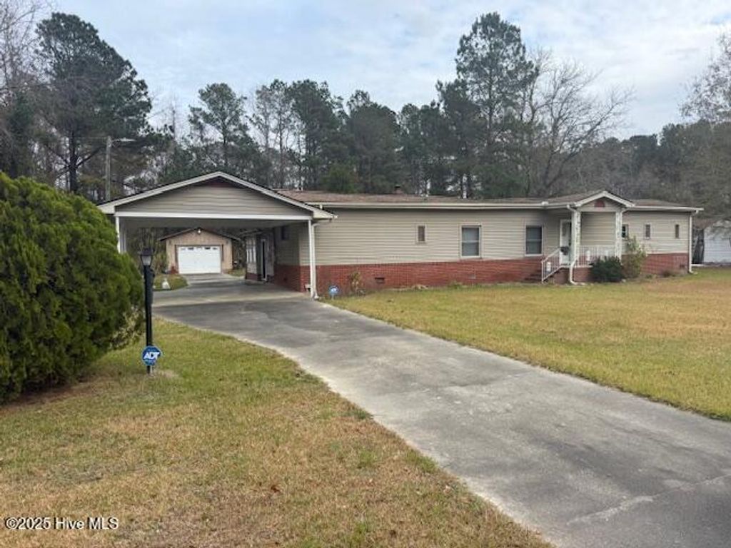 Photo of 323 Pierce Road, Hallsboro, NC 28442 (MLS # 100543270)