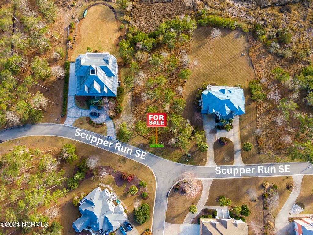 Photo of 3421 Scupper Run SE, Southport, NC 28461 (MLS # 100508192)