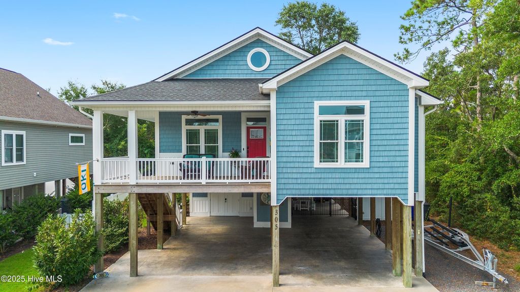 Photo of 305 E Yacht Drive, Oak Island, NC 28465 (MLS # 100522519)